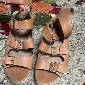 Gently worn. Super soft leather is pulled a tiny bit apart on the ankle strap.